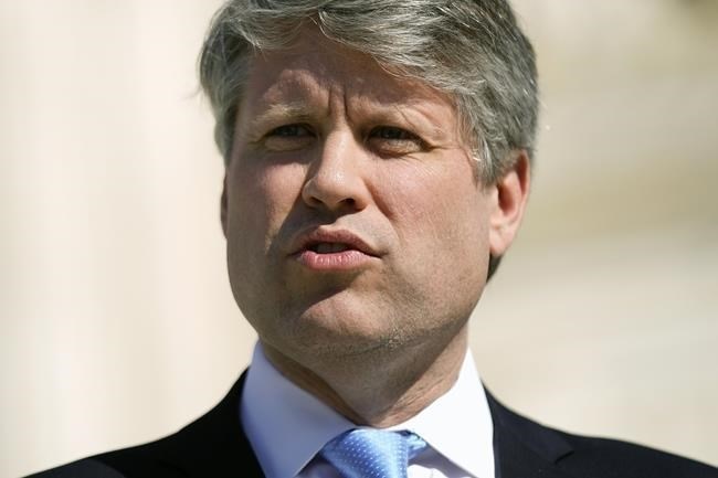 FILE - Nebraska Attorney General Mike Hilgers speaks with members of the media outside the Supreme Court on Capitol Hill, Feb. 28, 2023, in Washington.