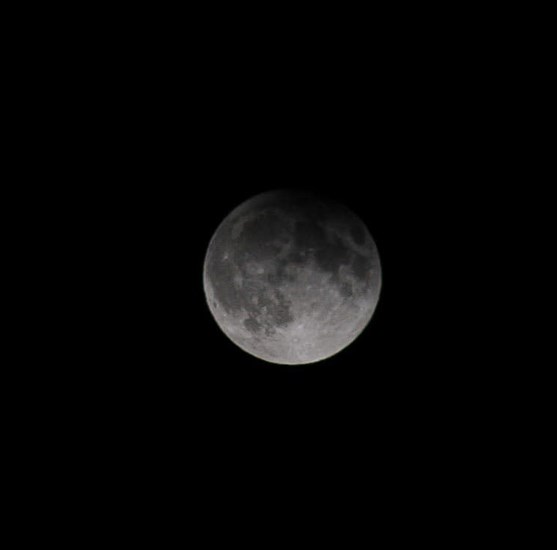 A full harvest moon is seen during a partial lunar eclipse in Kamloops. 