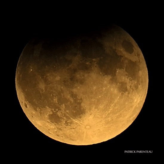 A photographer in Summerland captured a partial lunar eclipse. 