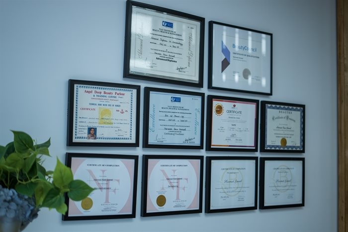 Letaya Salon wall of certificates