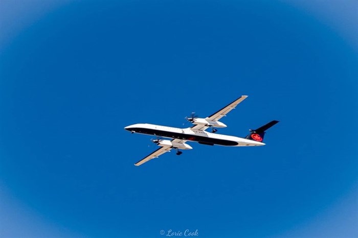 This commercial plane was photographed against a clear blue sky in Kamloops. 