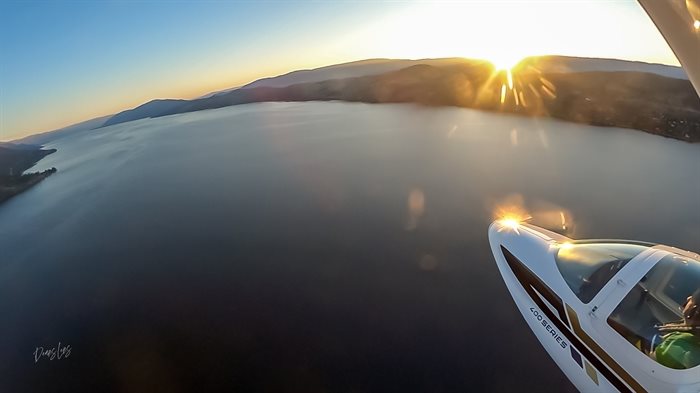 A personal aircraft flying over Okanagan Lake near West Kelowna is photographed with a GoPro. 