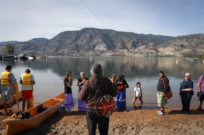 Herman Edward, of the Lower Similkameen Indian Band, addresses paddlers before a canoe journey from Skaha Lake to sx???x??nitk? (Okanagan Falls) on Sept. 21, during the syilx Nation’s 2024 salmon feast and celebration weekend.