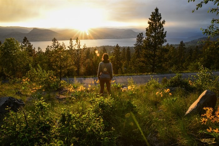 Woman enjoying the Sunset overlooking the Okanagan Lake in Penticton