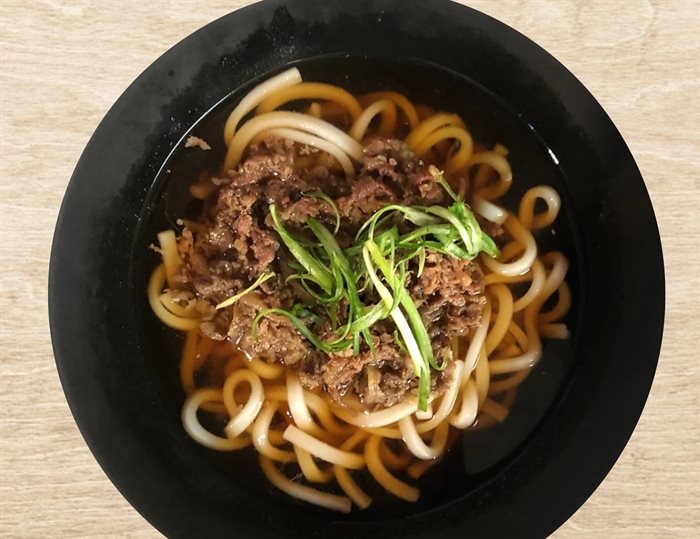 This bowl of ramen can be found at Raku Rice and Noodle Bar. 