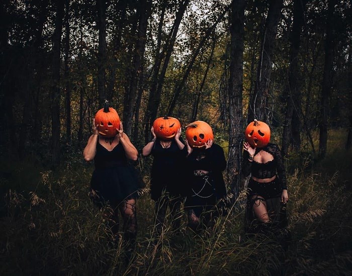 A group in Kelowna had spooky fun with jack-o-lanterns in the woods. 