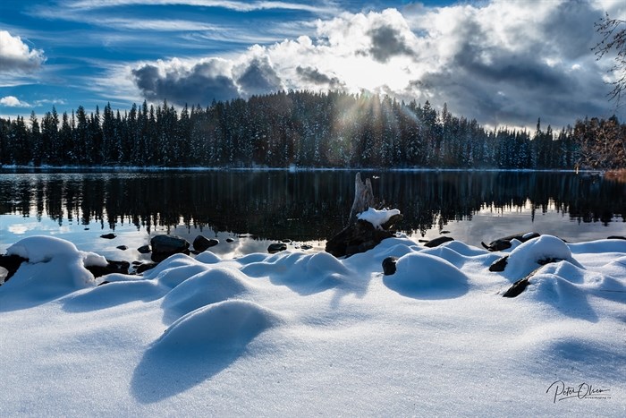 McConnell Lake in Kamloops is covered with fresh snow. 