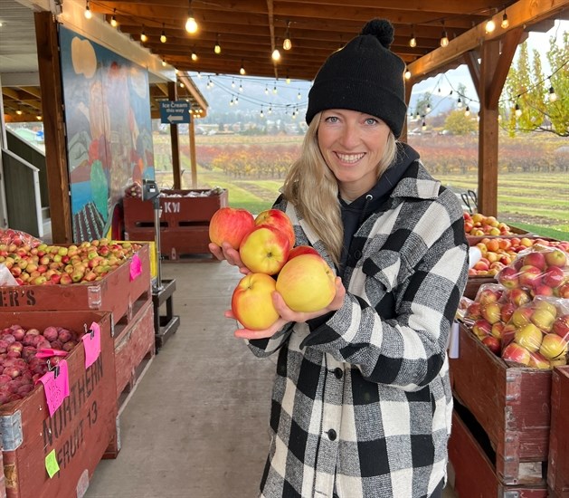 Jennay Oliver showing her locally sourced apples. 