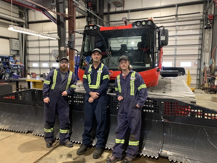 Steve Trenholm (middle) manages a five-person team of heavy duty mechanics. 