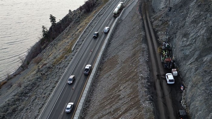 To manage the initial emergency, a 22-metre high temporary soil and rock berm was constructed along the toe of the slide to resist further slope movement. This temporary berm acts as a buttress for holding back slide movement until long term stabilization measures can be implemented.