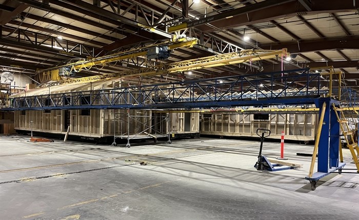 The assembly line building houses at the SRI Homes factory in Kelowna.