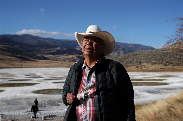 cewel’na Leon Louis of the Lower Similkameen Indian Band stands near Spotted Lake (kllilx’w ), located near Osoyoos (sw?iw?s) in syilx Okanagan homelands, on Oct. 27, 2022.