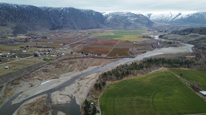 An aerial view of the Similkameen River, pictured on Dec. 4, 2024, flowing through the town of Keremeos in sm?lqmíx homelands.