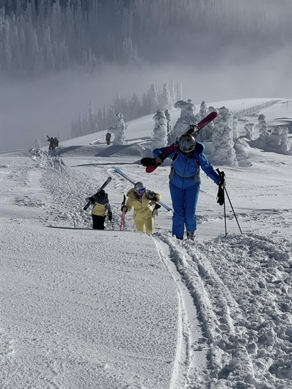 Skiers from Washington hike through a snowy scape at Sun Peaks Resort in December. 