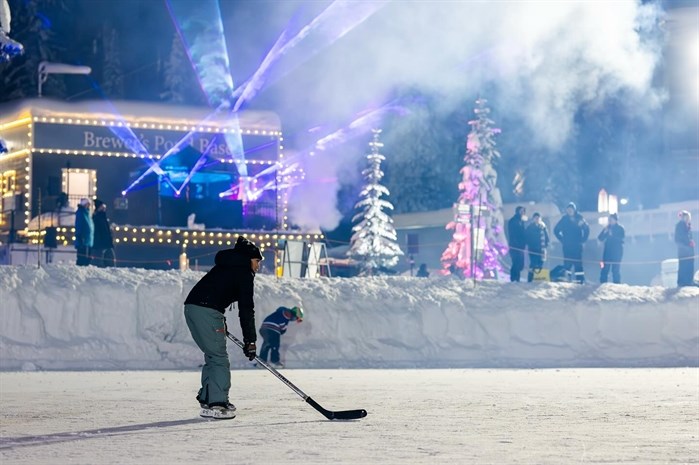 Kids play hockey on Brewers Pond at SilverStar Mountain Resort in January. 