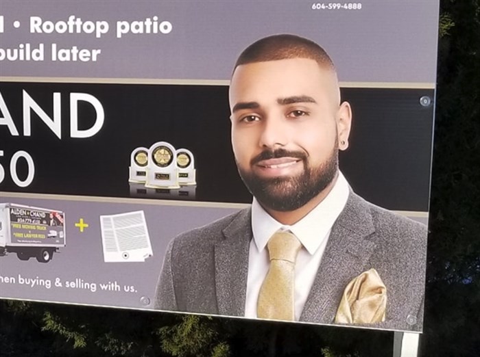 Former realtor Alden Ashneil Chand appears in this 2019 billboard.