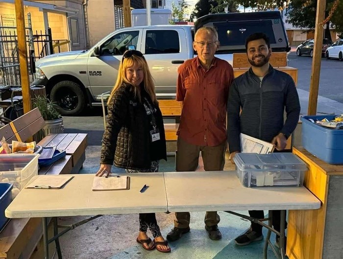 Volunteers at the Four Paws Food Bank Foundation in Kamloops at 185 Royal Avenue from left to right: Leona Pickard Smith, Dave Carlson and Shivam Sethi