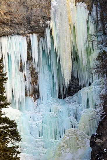 Water flowing down rocks in Westwold is frozen with colourful hues.  