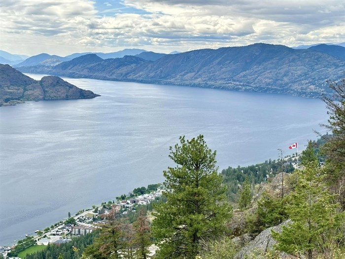 The flag on Pincushion Mountain in Peachland is seen waving in the summer, 2024.