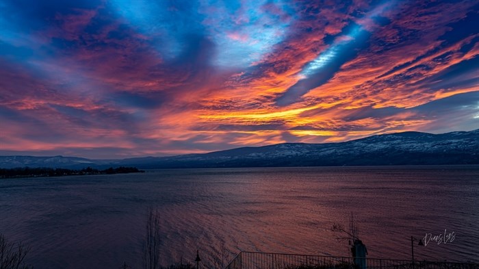 Low lying clouds are lit from the morning sun in West Kelowna in February. 