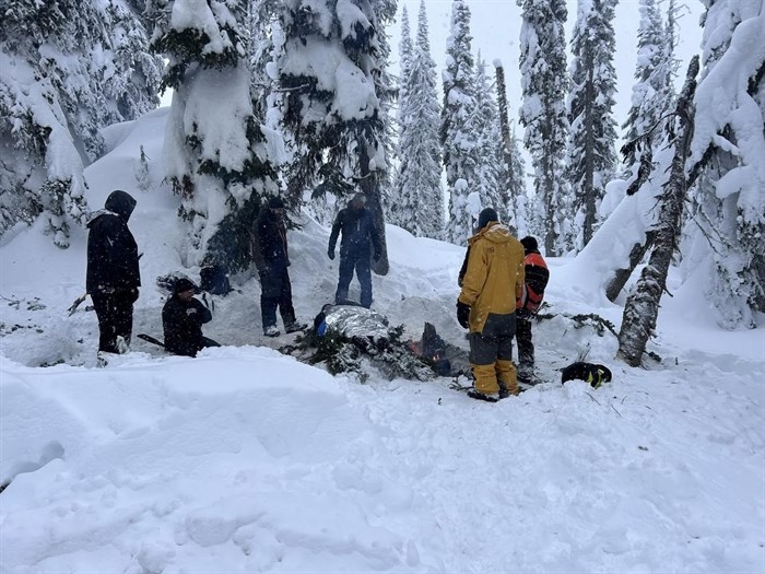 COSAR helping an injured snowmobile rider at Hunters Range on Feb. 21, 2025.