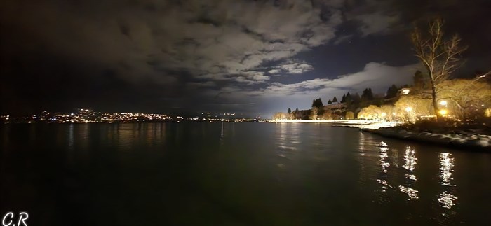 Stars peak from behind clouds at night in Summerland. 