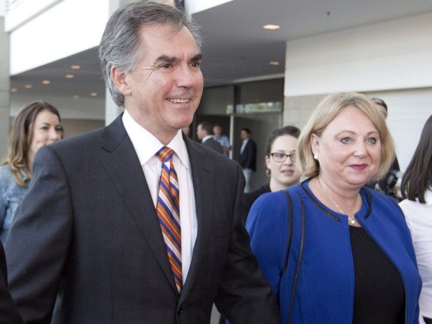 Jim Prentice and his wife Karen arrive before the results of the Progressive Conservative leadership first ballot in Edmonton on Saturday, Sept. 6, 2014.