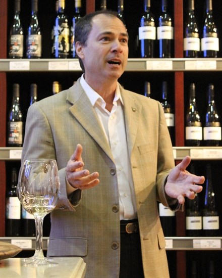 In this file photo, Agriculture Minister Norm Letnick makes an announcement in Penticton about a social media project involving B.C. wines, April 3, 2013. Letnick is praising Nova Scotia's decision to open it's borders to shipments of B.C. wine.