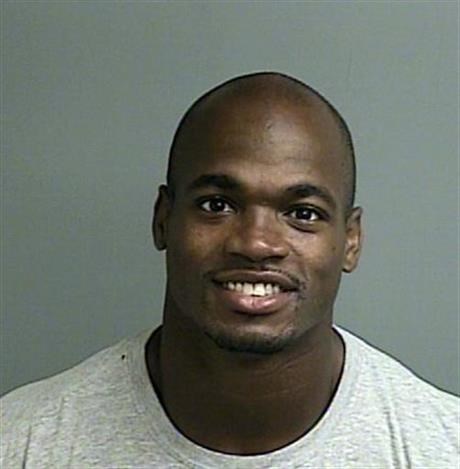 This photo provided by the Montgomery County sheriff’s office is Adrian Peterson's mugshot.