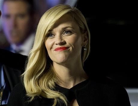 Reese Witherspoon poses for photographs on the red carpet for the movie 