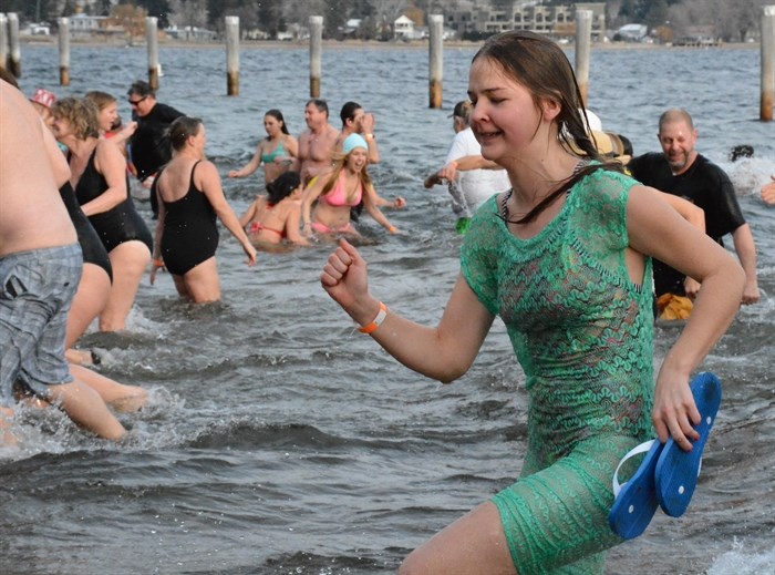 Eventually, the chill of the water was too much and most participants left the water in Peachland, January 1, 2015.