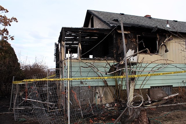 The City of Kelowna is looking to crack down on vacant properties or those damaged by fire. This file photo is actually from a house fire in Penticton.
