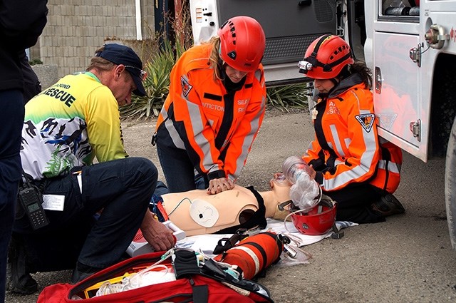 A simulated cardiac event ending in cardiac arrest had members Scott Hare of Princeton SAR, Christy Giles of Penticton SAR and Sil Huber of Penticton SAR treating the patient.