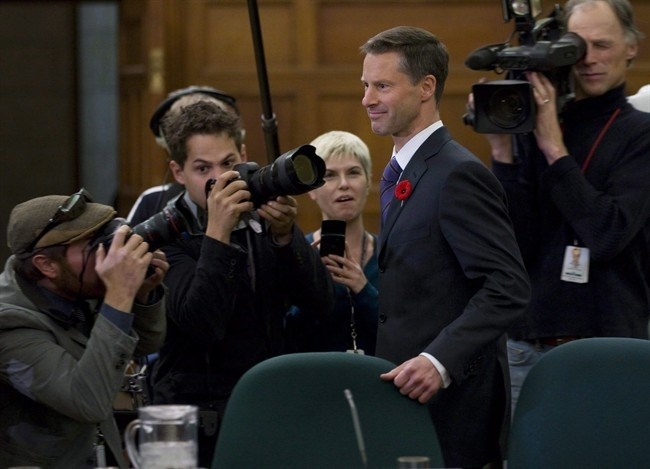 Nigel Wright, chief of staff for Prime Minister Stephen Harper, appears as a witness at the Standing Committee on Access to Information, Privacy and Ethics on Parliament Hill in Ottawa on Nov. 2, 2010. Nigel Wright is among dozens of people who are expected to make an appearance in an Ottawa courtroom over the next several weeks as suspended senator Mike Duffy stands trial on charges of fraud, breach of trust, and bribery. 