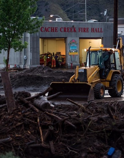 Flash flood damage outside Cache Creek fire hall, Saturday, May 23, 2015.