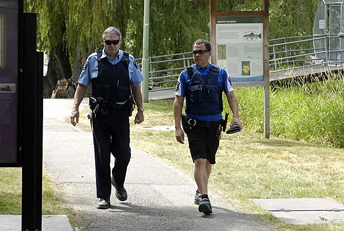 Bylaw officers patrol Lake Ave. beach access on June 24, 2015. Area residents say not enough is being done too keep them safe.