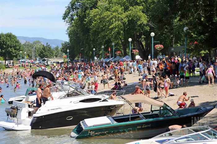 The beach and water park at Riverside Park are usually quite busy on Canada Day.