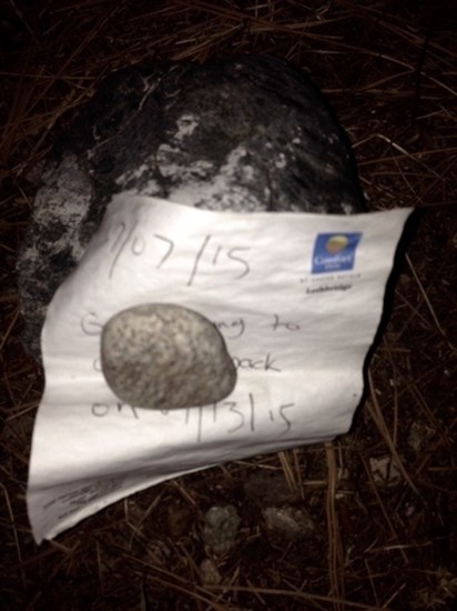 A photo of the note left with the abandoned tent and cooler.