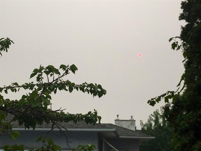 The view of the sun in a photo taken in Kelowna and posted to Twitter, Sunday, Aug. 23, 2015.
