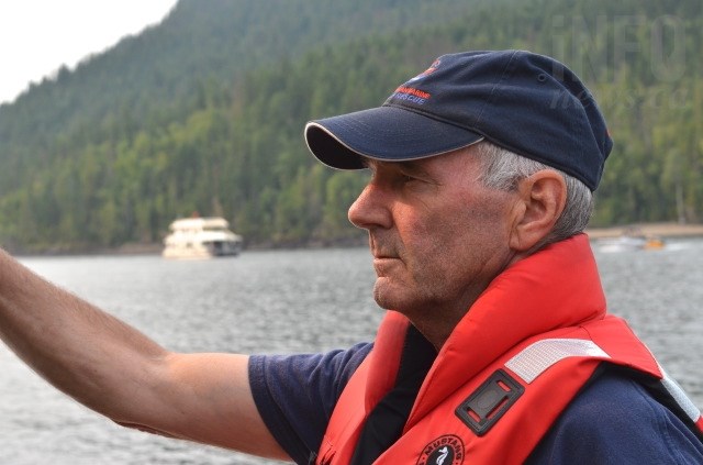 Rob Sutherland, a volunteer with Royal Canadian Marine Search and Rescue, overlooks the Cinnemousun Narrows, where the four arms of Shuswap Lake meet. 