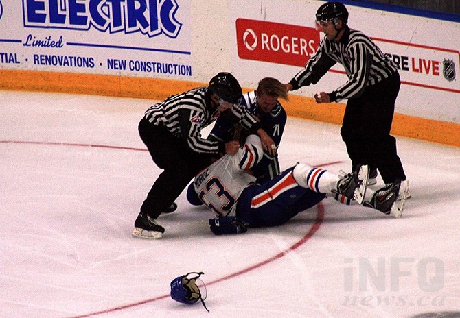 Fisticuffs broke out between Vancouver's Stewart Mackenzie and Edmonton's Mitchell Moroz.