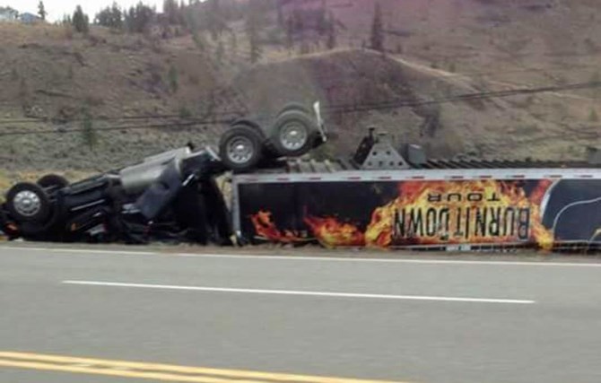 A truck carrying equipment for Jason Aldean's Burn it Down tour flipped near Cherry Creek early this morning, Oct. 6, 2015.