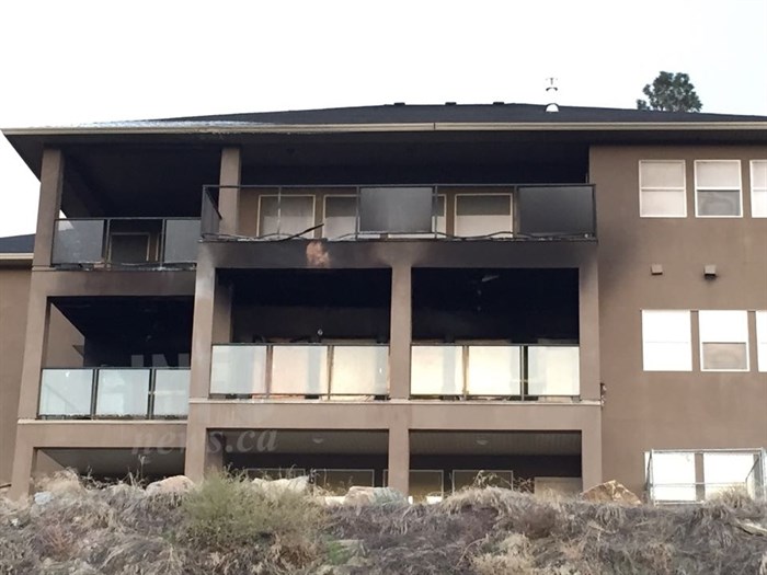 Fire crews were able to quickly knock down flames at a house on Empire Place in West Kelowna Wednesday night, Nov. 11, 2015, but not before all three floors were damaged by fire or smoke.