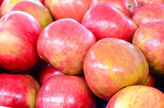 Okanagan apple growers are reeling from low prices and an influx of Washington State apples.	