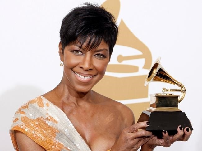 FILE PHOTO - In a Sunday, Feb. 8, 2009 file photo, Natalie Cole holds the best instrumental arrangement accompanying vocalist award backstage at the 51st Annual Grammy Awards, in Los Angeles. Cole, the daughter of jazz legend Nat 