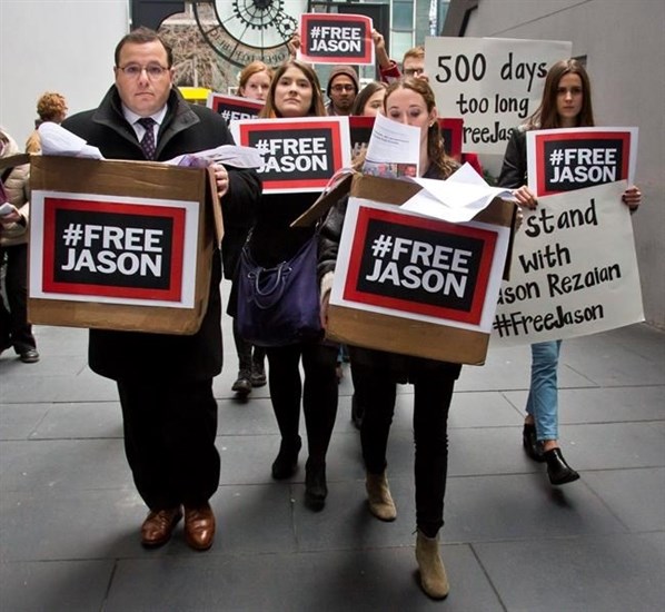 FILE PHOTO - In this Dec. 3, 2015 file photo, Ali Rezaian, far left, the brother of Washington Post reporter Jason Rezaian, rallies with supporters to deliver a petition of 500,000 signatures to Iran's United Nations mission asking for the release of his brother from prison, in New York.
