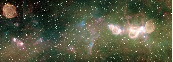 This is a radio image made during the Canadian Galactic Plane Survey. The primary instrument in the project was the DRAO Synthesis Radio Telescope.
In the top left corner is a 