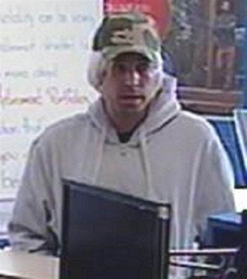 Police are looking for this man after a robbery at the Bank of Montreal in Salmon Arm March 23, 2016. 