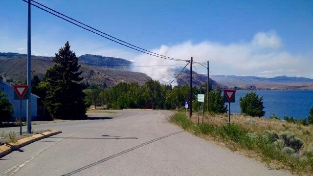 Smoke from a grass fire in Savona can be seen in this photo on Saturday, May 14, 2016.