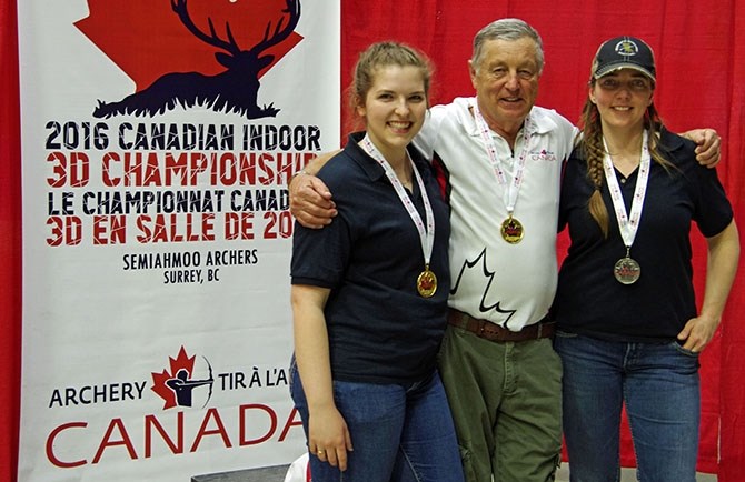 Women's longbow archer Miranda Sparkes, archery coach Brock Paton and fellow archer Sarah Martin.